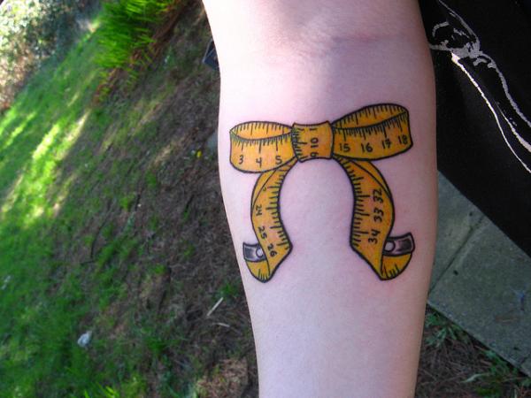 Tape Measure Bow Tattoo