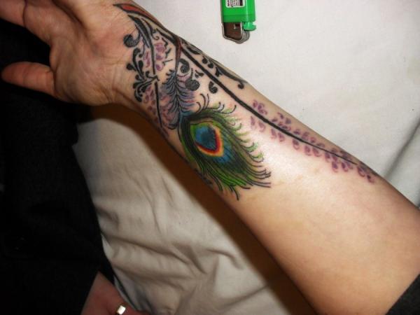 Tatouage plume de paon