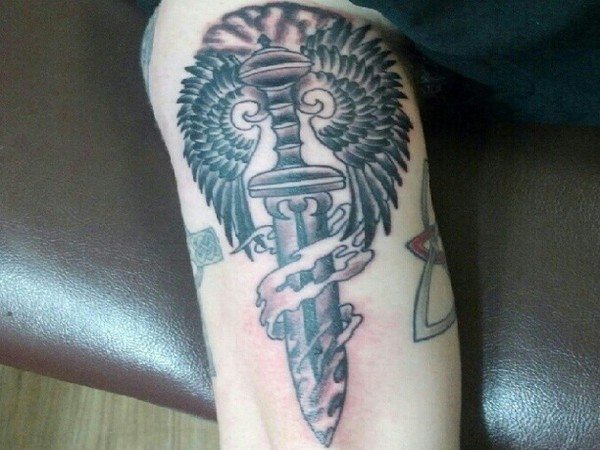Winged Dagger Arm Tattoo