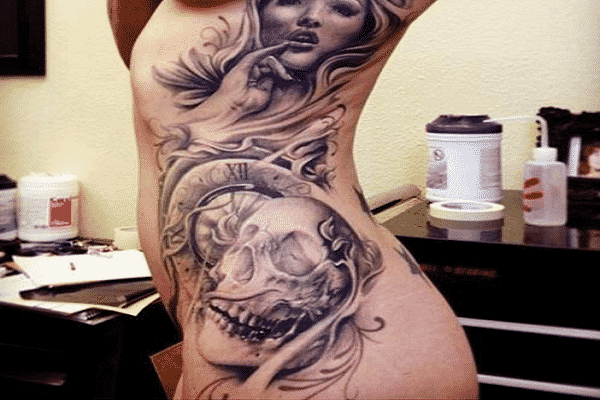 Ghost Skull Hip Tattoo