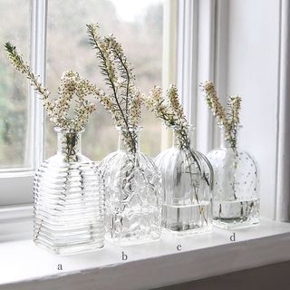 Vase bouteille carré en verre pressé