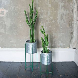 Ensemble de deux supports pour plantes ronds en zinc