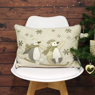 Housse de coussin pingouins de luge