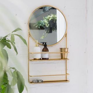 Miroir de salle de bain circulaire or ou argent avec étagères