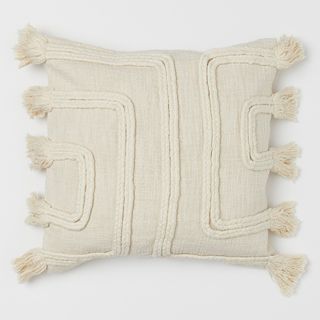 Housse de coussin à pompons