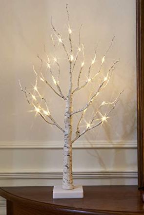 Λευκό δέντρο με φώτα