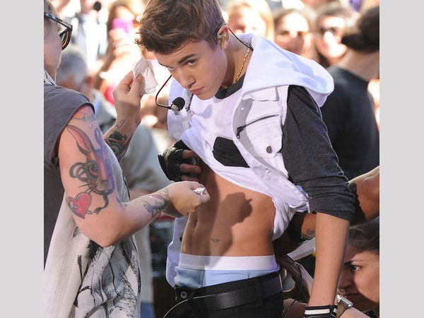 Bieber Stomach Tattoo