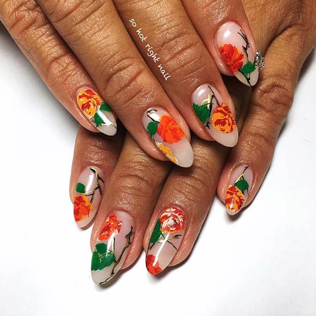 Art d'ongle floral orange pour l'idée d'ongles d'été