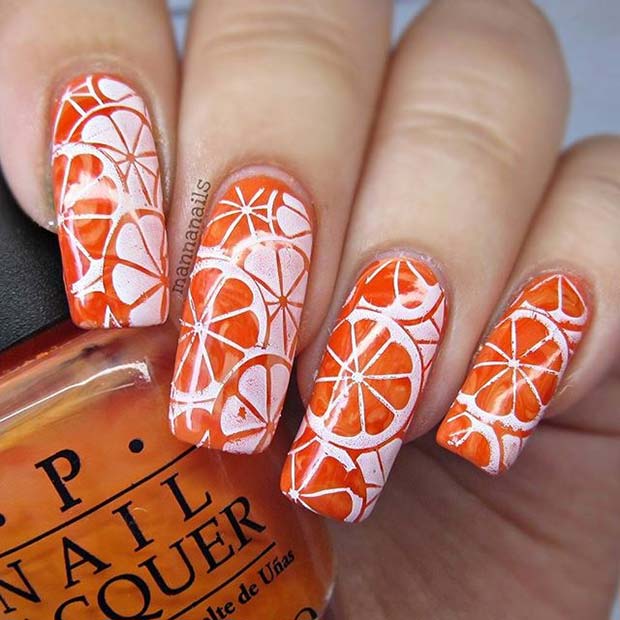 Design orange vif pour des idées d'ongles d'été