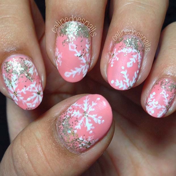 Conception d'ongles en flocon de neige rose et blanc