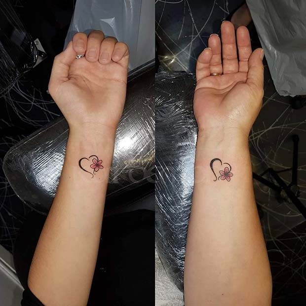 Conception de tatouage de fleur et de coeur pour les tatouages ​​​​populaires de la mère et de la fille