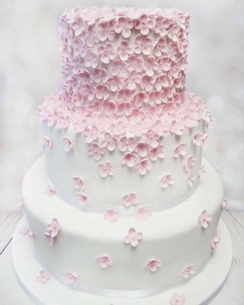 Ροζ γαμήλια τούρτα με λουλούδια