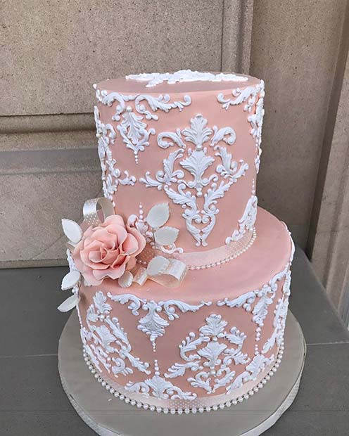 Κομψή ροζ και λευκή γαμήλια τούρτα