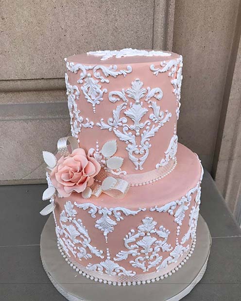 Gâteau de mariage élégant en dentelle rose et blanche