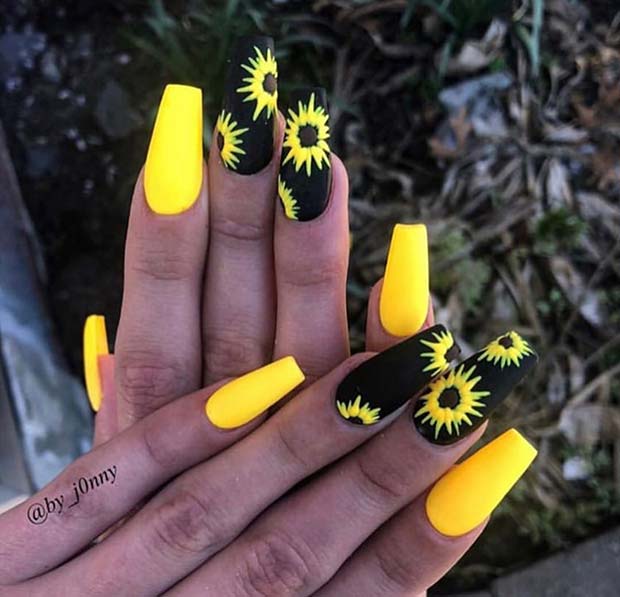 Ongles de tournesol noirs et jaunes