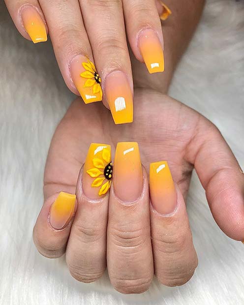 Ongles ombrés jaunes avec des tournesols