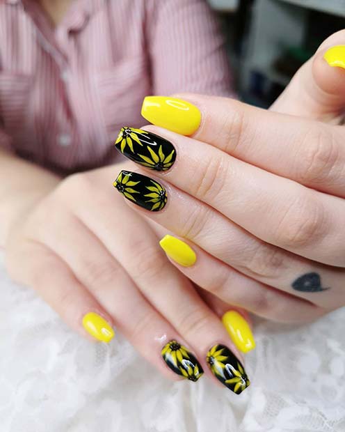 Ongles de tournesol noirs et jaunes