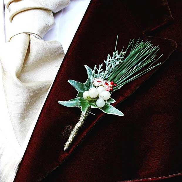 Idée de boutonnière de gui pour un mariage d'hiver