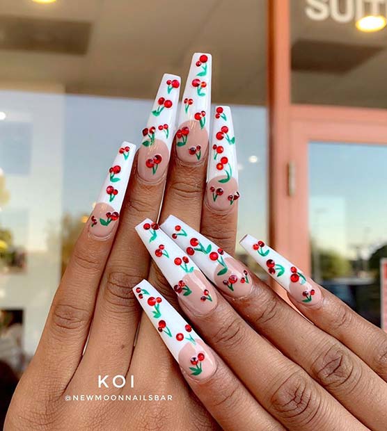 Ongles nude avec pointes blanches et cerises