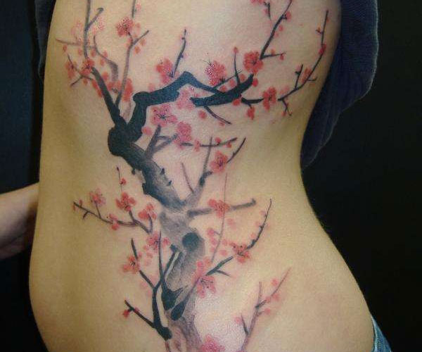 Tatouage de côte de fleur de cerisier japonais