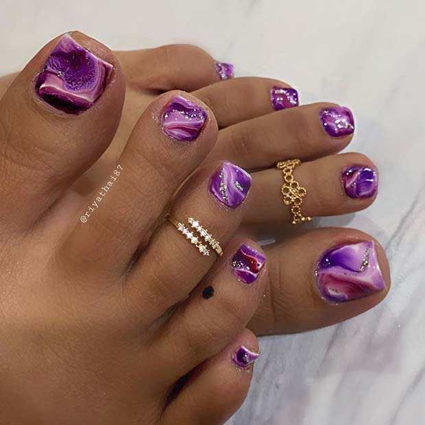 Conception d'ongles en marbre violet