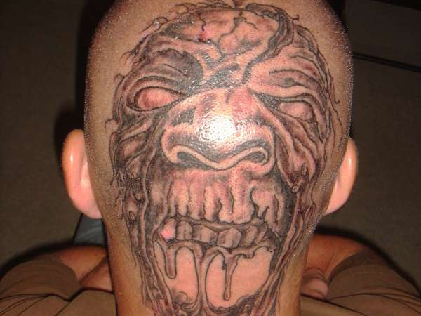 Monster Head Tattoo