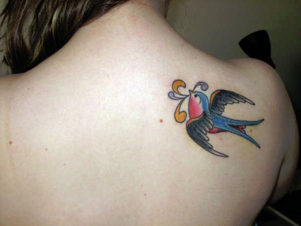 Κομψό τατουάζ πουλιών