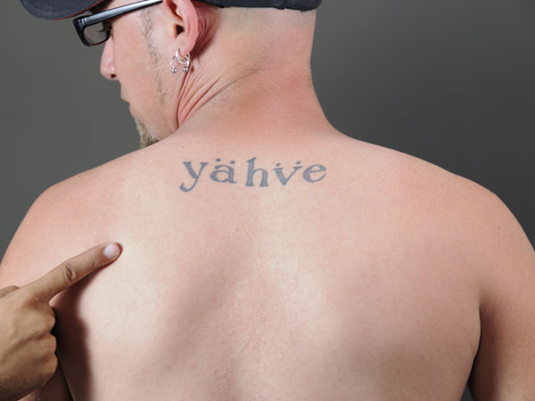 Serif Font Back Tattoo