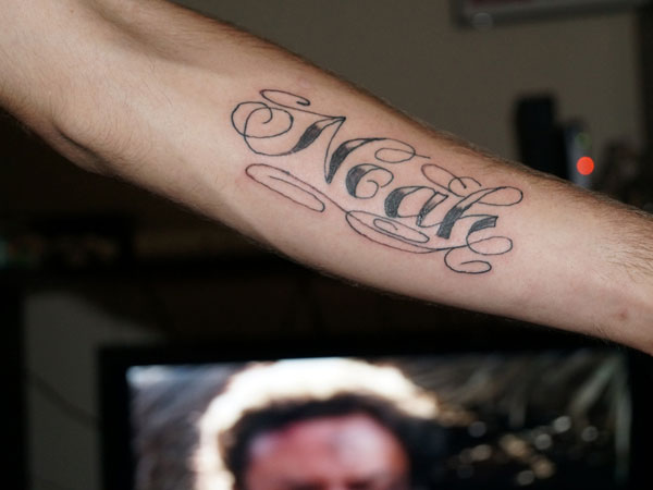 Πολλά Loops Word Tattoo