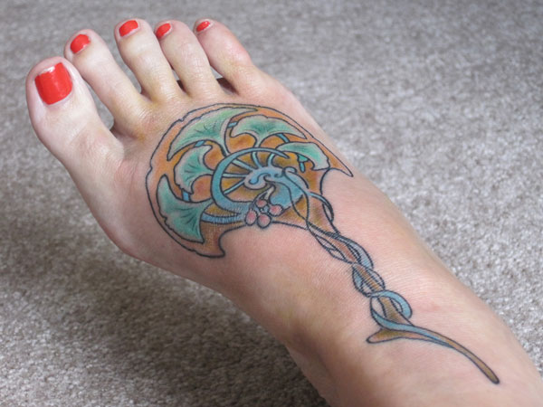 Tatouage de pied intrigant