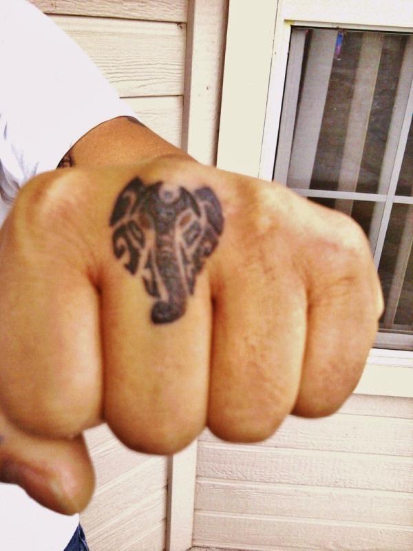 Elephant Face Knuckle Tattoo
