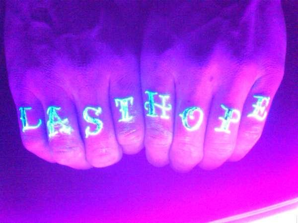 Black Light Knuckle Tattoos