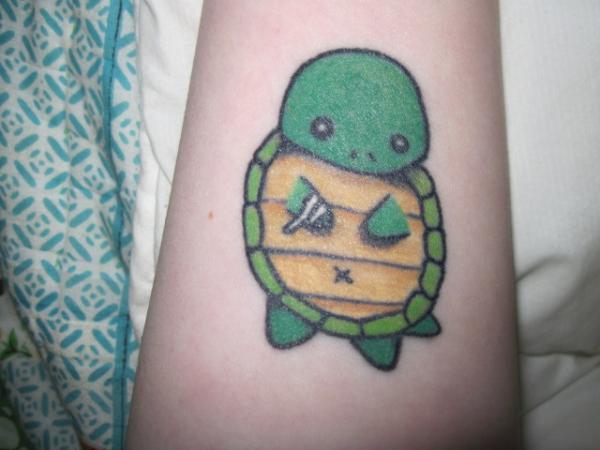 Πράσινο χαριτωμένο τατουάζ χελώνας