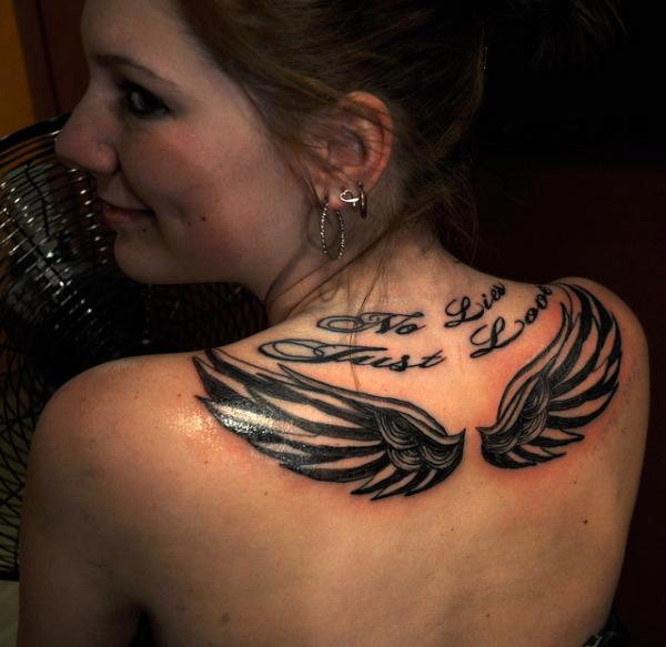 Wings On Upper Back Tattoo