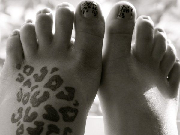 Tatouage de léopard des pieds