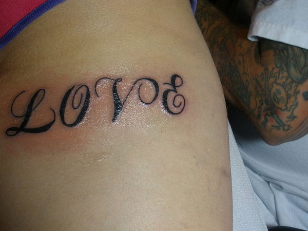 Love Tattoo on the Arm