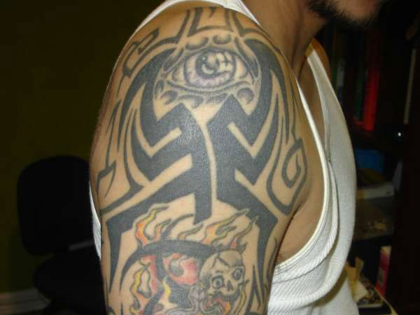 Creepy Tribal Tattoo