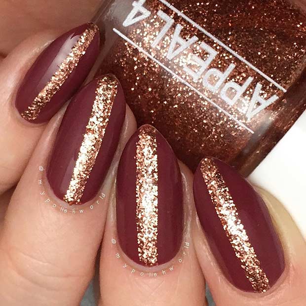 Ongles mats bordeaux et scintillants pour le réveillon du Nouvel An