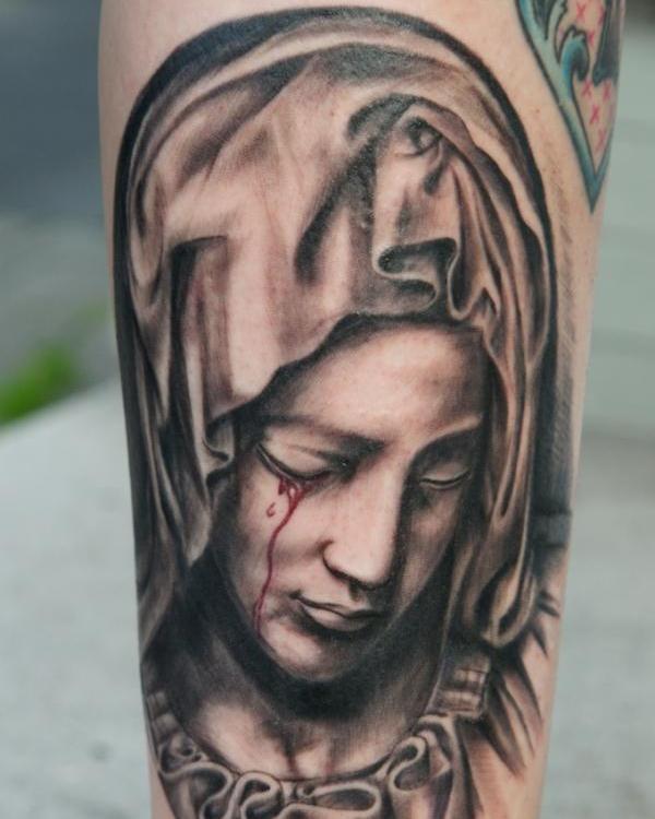 Tatouage Vierge Marie qui pleure