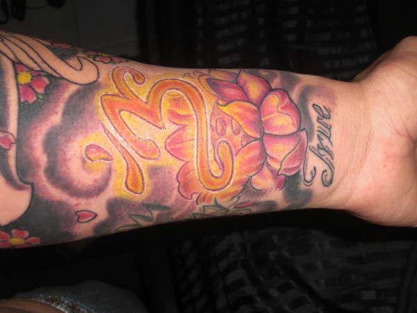 Tatouage Lotus Et Om