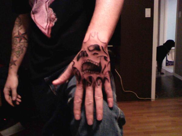 Ghost Hand Tattoo