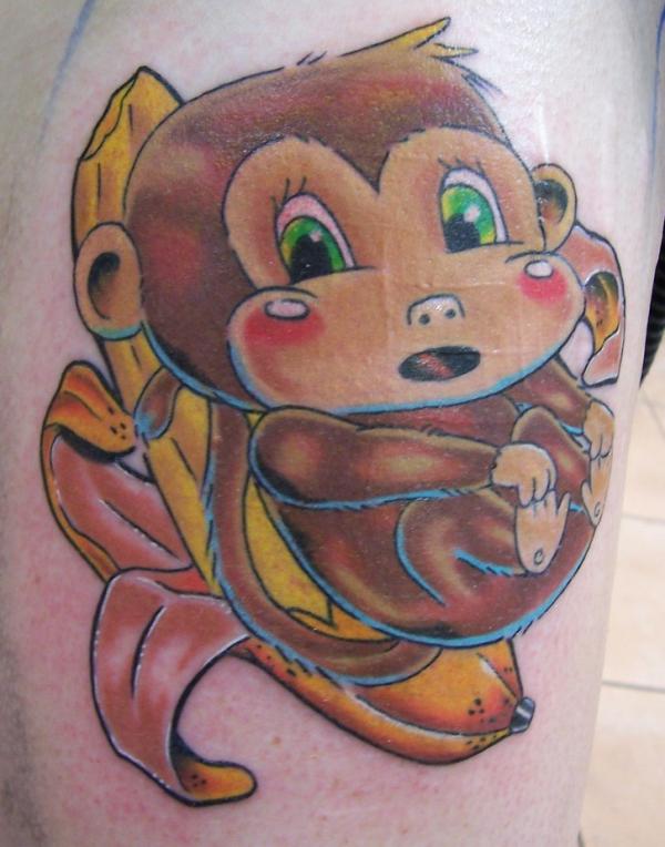 Tatouage de singe mignon