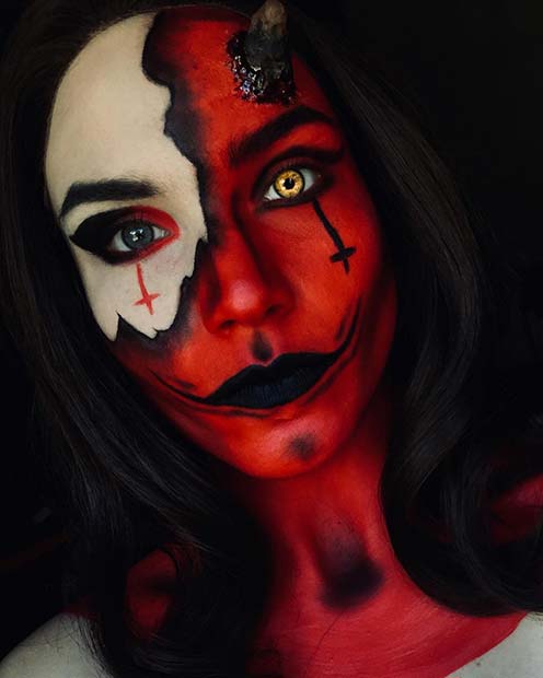 Maquillage effrayant de diable avec des croix