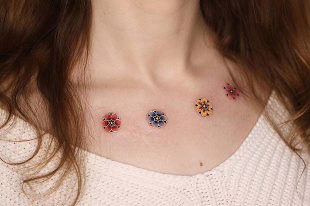 Πολύχρωμα λουλούδια κολάρο τατουάζ