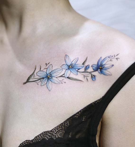 קעקוע עצם צווארון פרח כחול יפה