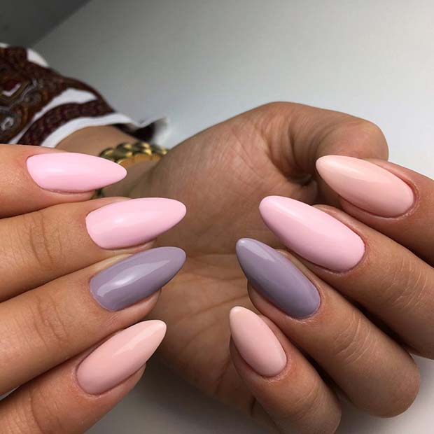 Conception d'ongles rose clair et violet