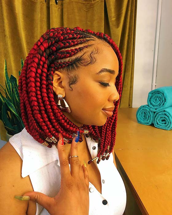 Tresses de cornrow rouges vibrantes