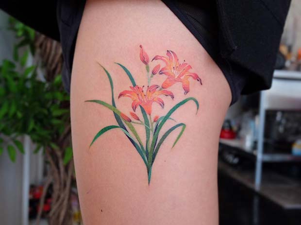 Λεπτή και πολύχρωμη ιδέα τατουάζ Lily
