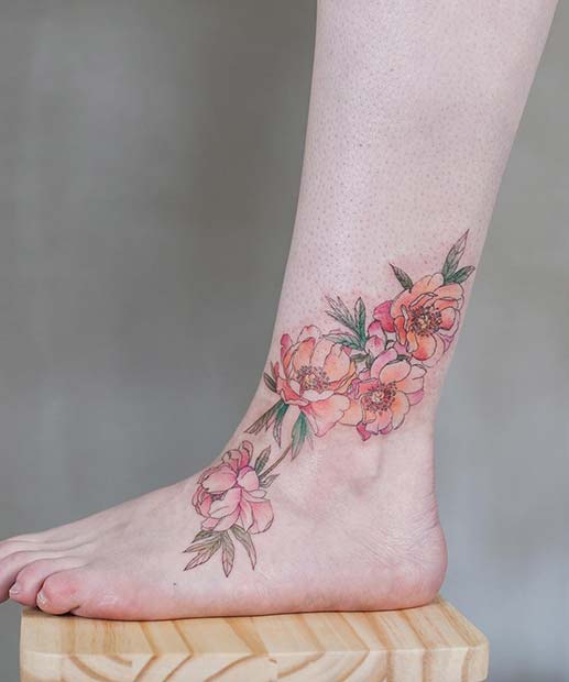 Tatouage floral pied et cheville