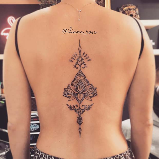 Conception de tatouage de colonne vertébrale de lotus